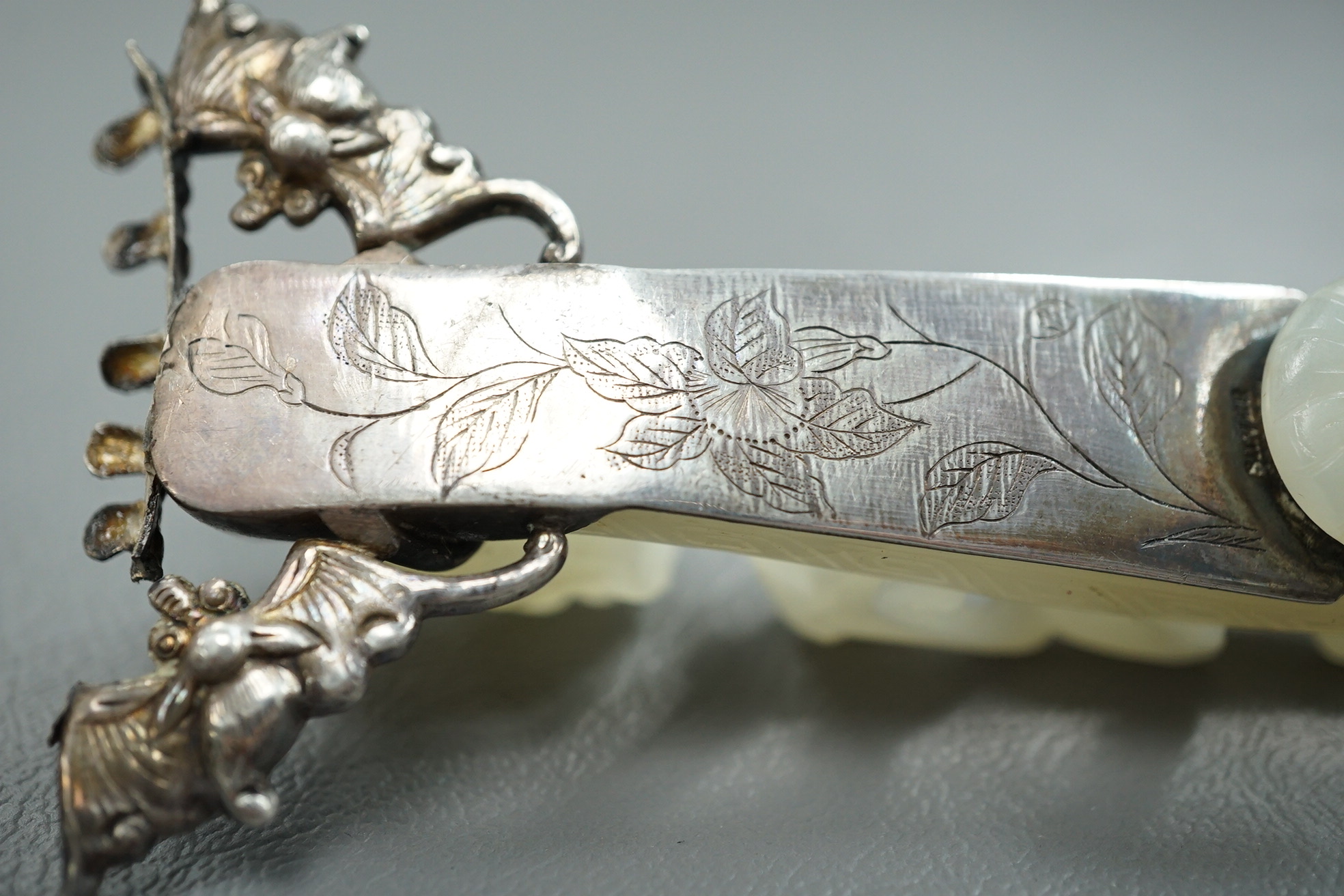 A Chinese jade and cabochon mounted hand mirror, the jade 18th/19th century